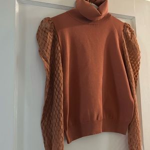 Neutral pink knit turtleneck